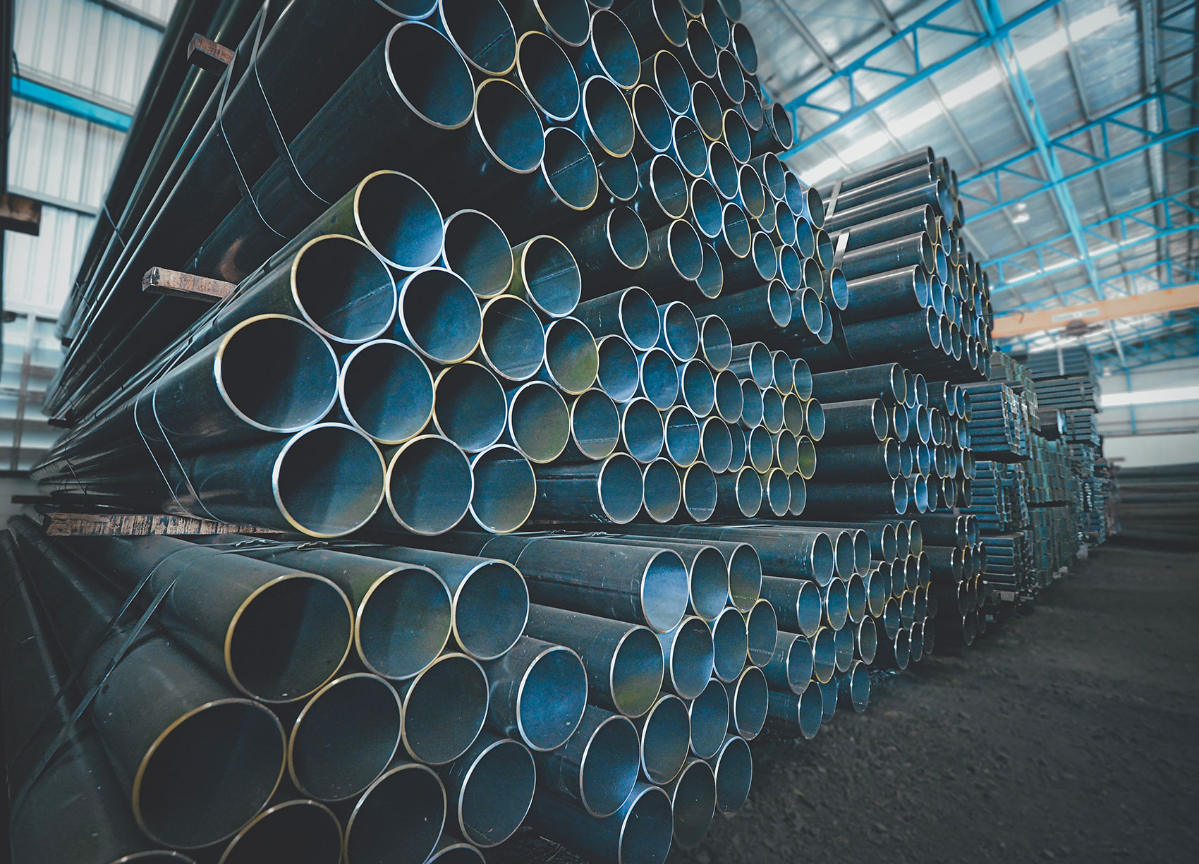 Stacked structural steel tube ready for supply